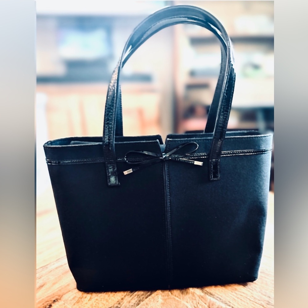 Stuart Weitzman satchel handbag with original Dust Bag - color is black EUC